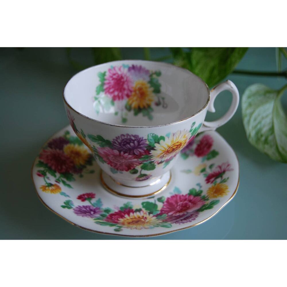 Queen Anne bone china “Autumn Glory” Floral footed teacup & saucer, 1980s